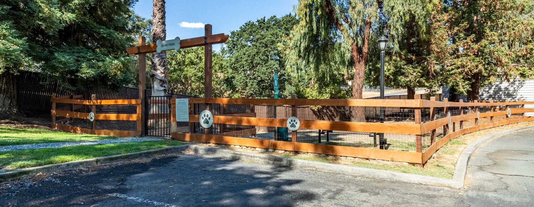 a fenced off area with trees