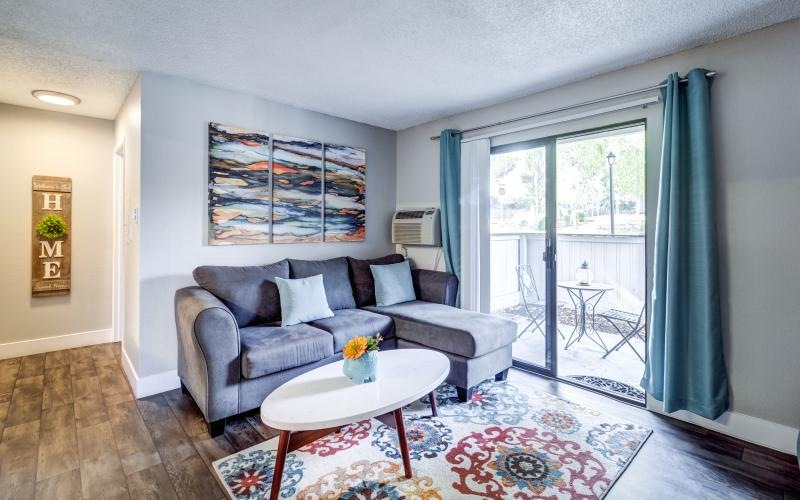a living room with a couch and a table